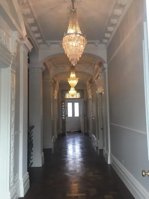 hall, white walls, dark wooden floor