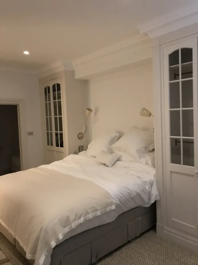 large bed, two alcoves on the sides