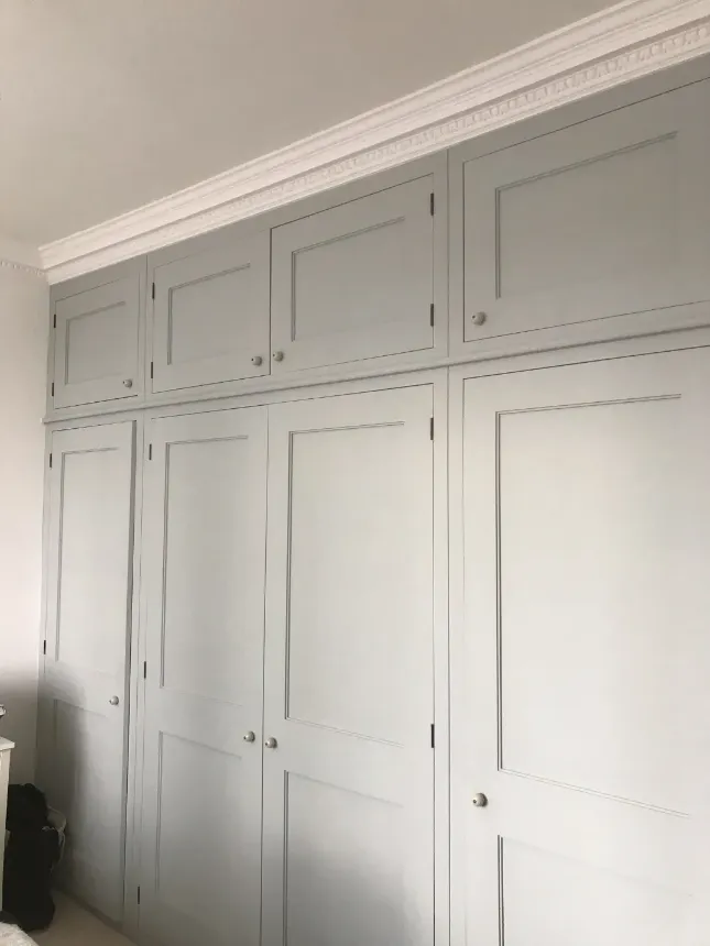 white wardrobe on whole wall
